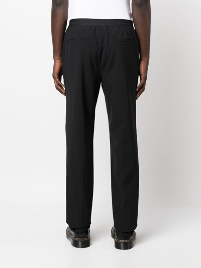 Shop Msgm Logo-waistband Straight-leg Trousers In Black