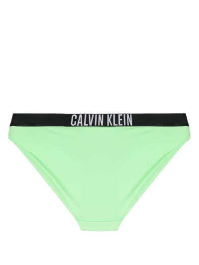 Shop Calvin Klein Logo-waistband Bikini Bottoms In Green