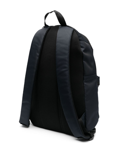 Shop Tommy Hilfiger Logo-print Zipped Backpack In Black