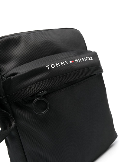 Shop Tommy Hilfiger Logo-print Zipped Messenger Bag In Black