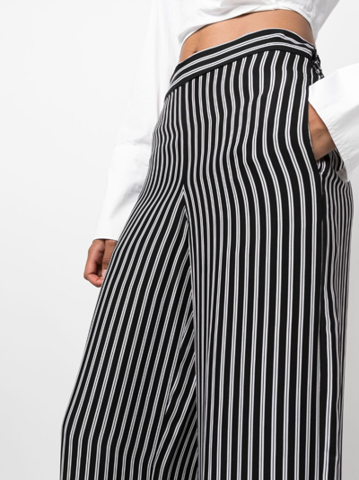 Shop Michael Michael Kors Striped Wide-leg Trousers In Black