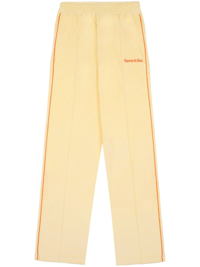 Shop Sporty And Rich Logo-embroidered Terrycloth Track Pants In Gelb