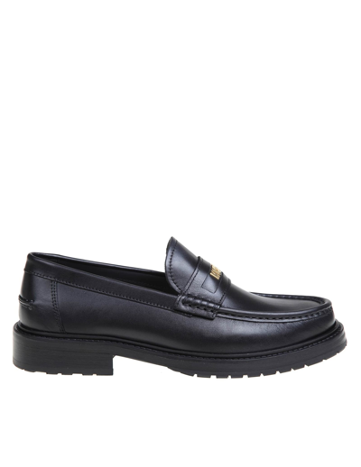 Shop Moschino Leather Loafers With Lettering Logo In Black/gold
