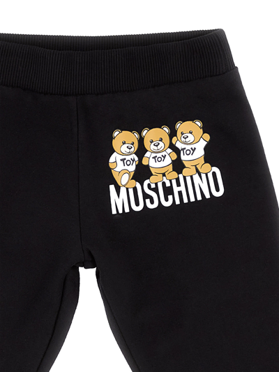Shop Moschino Logo Trackpants In Black