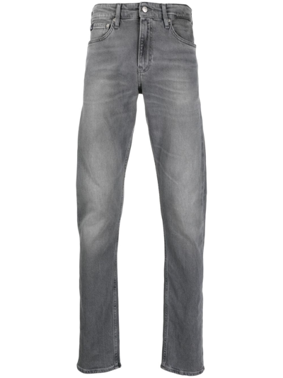 Shop Calvin Klein Jeans Est.1978 Logo-patch Mid-rise Slim-fit Jeans In Grey