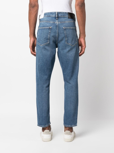 Shop Calvin Klein Logo-patch Mid-rise Tapered Jeans In Blue