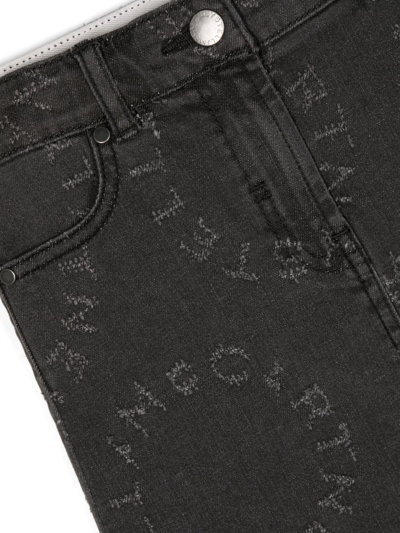 Shop Stella Mccartney Monogram-pattern Denim Skirt In Black