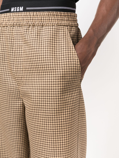 Shop Msgm Logo-waistband Wide-leg Trousers In Neutrals