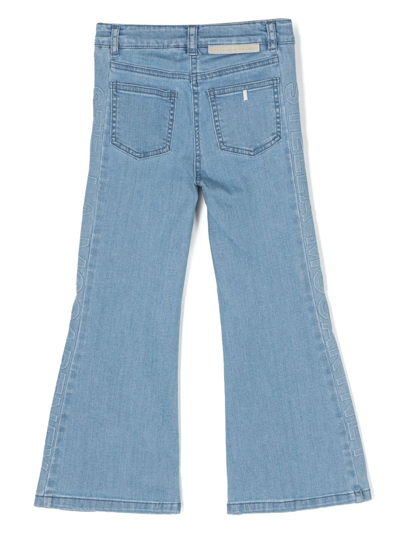 Shop Stella Mccartney Logo-debossed Cotton Jeans In Blue