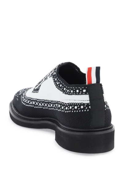 Shop Thom Browne Longwing Brogue Loafers In Trompe L'oeil Knit In Black,white