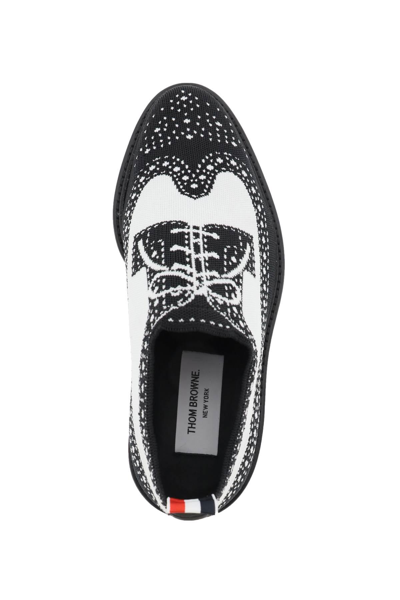 Shop Thom Browne Longwing Brogue Loafers In Trompe L'oeil Knit In Black,white
