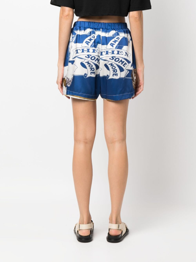 Shop Msgm Graphic-print Satin Mini Shorts In Blue
