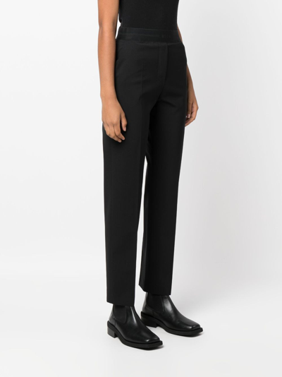 Msgm Logo-waistband Tapered Trousers In Black