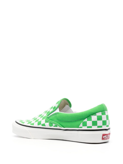 Shop Vans Checkerboard Slip-on Sneakers In Green