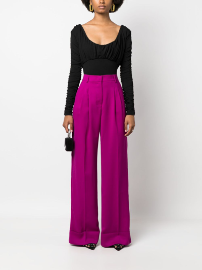 The Andamane Wide-leg Flared Trousers In Pink