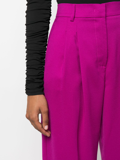 The Andamane Wide-leg Flared Trousers In Pink