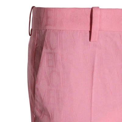 Shop Versace Trousers Pink