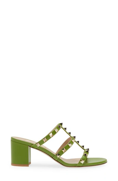Shop Valentino Rockstud Slide Sandal In Chartreuse
