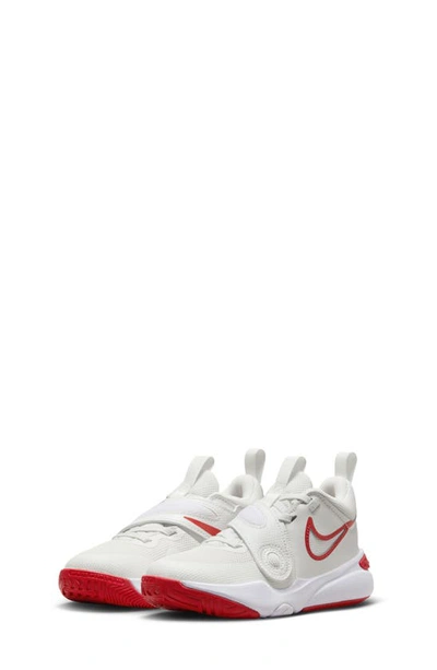 Shop Nike Kids' Team Hustle D 11 Basketball Sneaker In White/ White/ Red