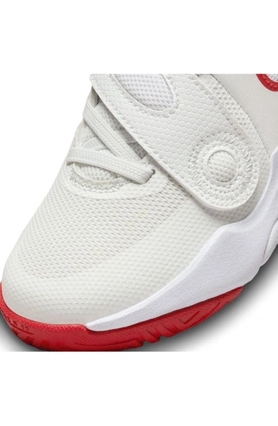 Shop Nike Kids' Team Hustle D 11 Basketball Sneaker In White/ White/ Red