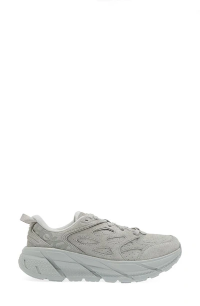 Shop Hoka Gender Inclusive Clifton L Suede Sneaker In Limestone / Limestone