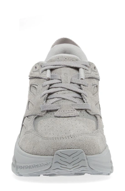 Shop Hoka Gender Inclusive Clifton L Suede Sneaker In Limestone / Limestone