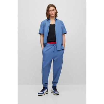 Shop Hugo Cotton-terry Tracksuit Bottoms With Logo Print In Blue