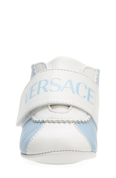 Shop Versace Logo Embroidered Crib Shoe In Baby Blue/ White