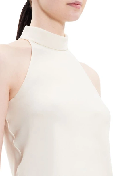 Shop Theory Roll Neck Recycled Polyester Halter Top In Ivory