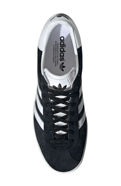 Shop Adidas Originals Gazelle 85 Sneaker In Black/ White/ Gold Met.