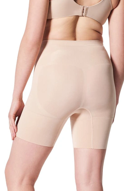 Shop Spanx Oncore Mid Thigh Shorts In Soft Nude