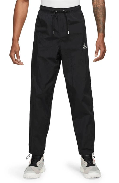 Shop Jordan Essentials Statement Warm-up Pants In Black/ Sail