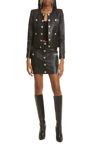 Shop L Agence L'agence Truman Snap Faux Leather Miniskirt In Black