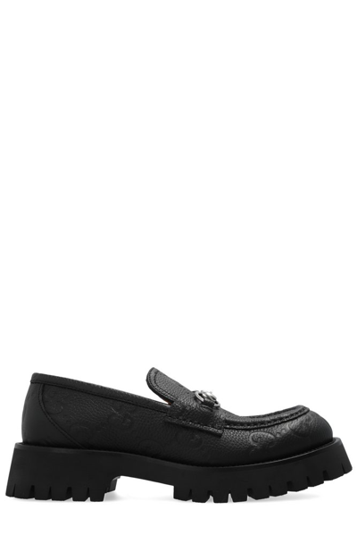 Shop Gucci Gg Lug Loafers In Black