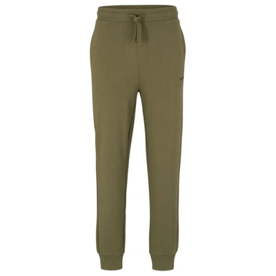 Shop Hugo Cotton-terry Tracksuit Bottoms With Logo Print In Green