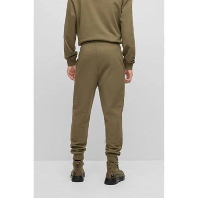 Shop Hugo Cotton-terry Tracksuit Bottoms With Logo Print In Green