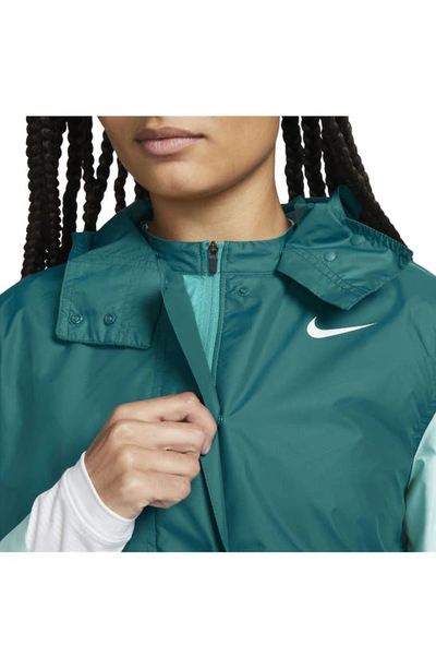 Shop Nike Tour Water Repellent Hooded Golf Jacket In Geode Teal/ Teal Nebula