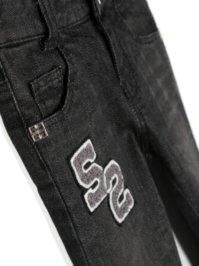 Shop Givenchy Logo-patch Straight-leg Jeans In Black