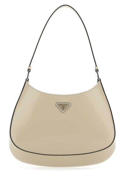 Shop Prada Cleo Logo Plaque Shoulder Bag In Beige