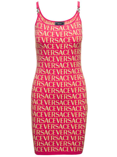 Shop Versace Mini Fuchsia Dress With All-over Logo Lettering Print And Medusa Detail In Cotton Blend Woma In Fuxia