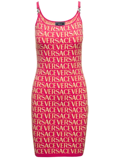 Shop Versace Mini Fuchsia Dress With All-over Logo Lettering Print And Medusa Detail In Cotton Blend Woma In Fuxia
