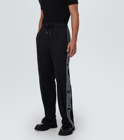 Shop Versace Allover Jacquard Sweatpants In Black