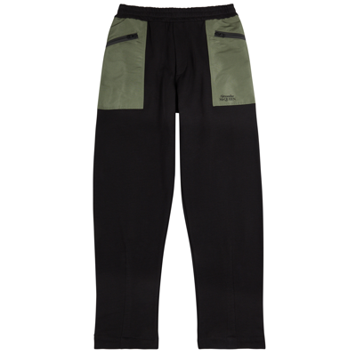 Shop Alexander Mcqueen Panelled Cotton Sweatpants In Black