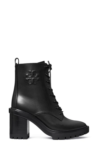 Shop Tory Burch Logo Embossed Lug Boot In Perfect Black / Perfect Black