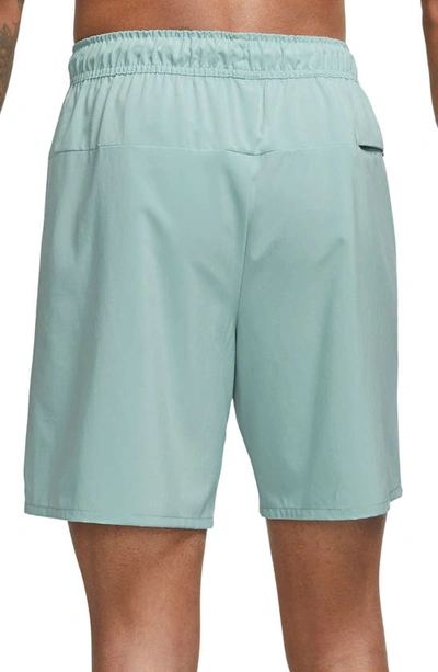 Shop Nike Dri-fit Unlimited 7-inch Unlined Athletic Shorts In Mineral/ Mineral/ Mineral