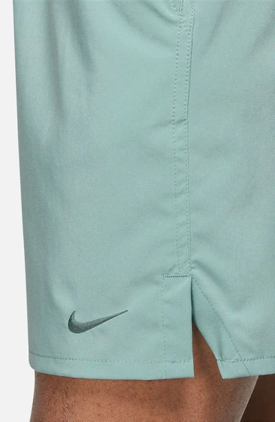 Shop Nike Dri-fit Unlimited 7-inch Unlined Athletic Shorts In Mineral/ Mineral/ Mineral