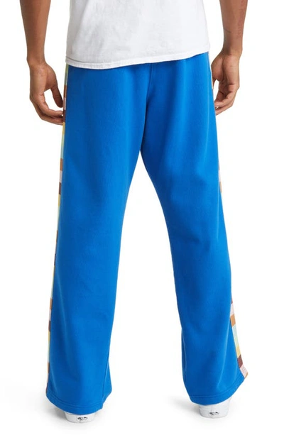 Shop Krost X Hasbro Boardwalk Stripe Sweatpants In Snorkel Blue