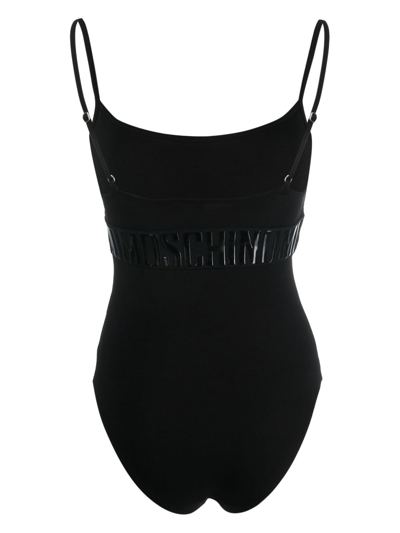 Shop Moschino Embossed-logo Cotton Bodysuit In Black