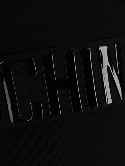 Shop Moschino Embossed-logo Cotton Bodysuit In Black