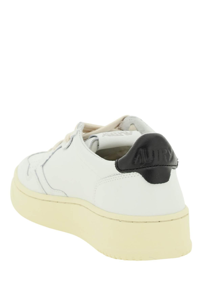 Shop Autry Leather Medalist Low Sneakers In White,black